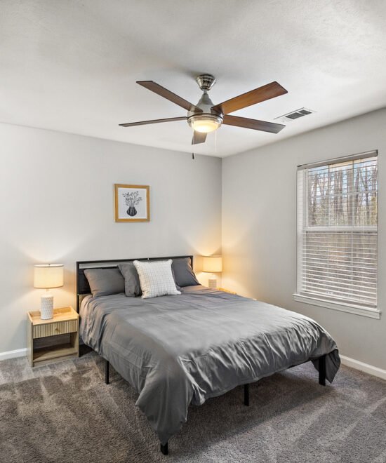 Bedroom inside the furnished 791 W County Line Road home