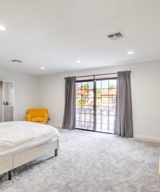 Furnished living area in The Lakes community home