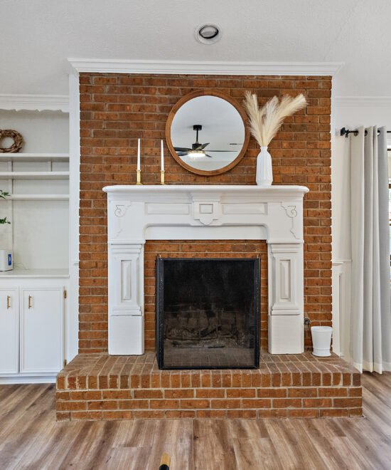 Living room with fireplace in a furnished home